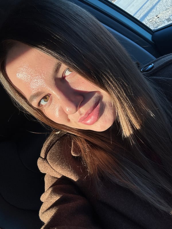 Woman takes selfies in car in Likino-Dulyovo, Russia