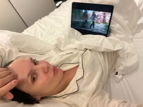 Woman rests in bed in Osaka residence