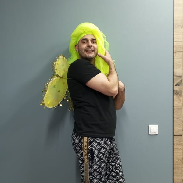 Person poses in costume changes during indoor photo session