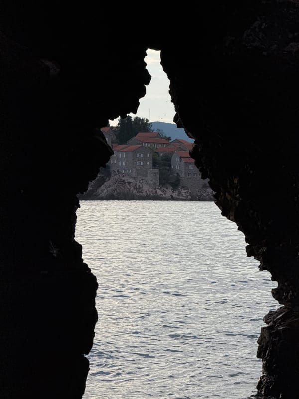 Inside a coastal cave at Sveti Stefan, looking out to sea