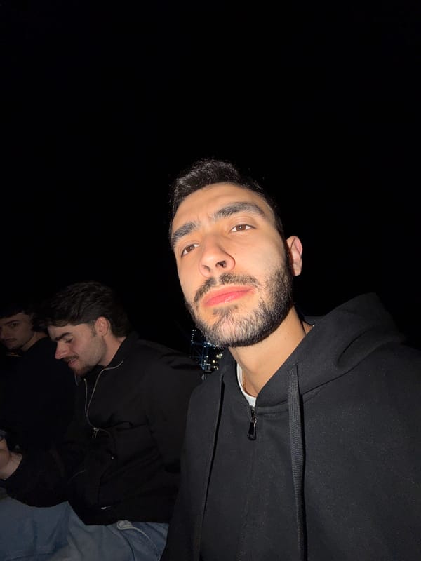 Three friends photograph together during night out in Rijeka