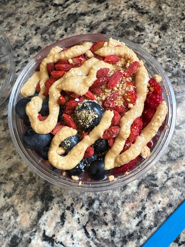 Evening acai bowl preparation captured in Seal Beach kitchen
