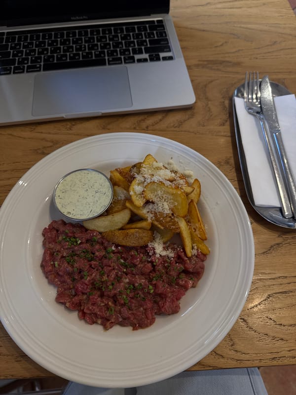 Woman dines on steak tartare at Belgrade restaurant