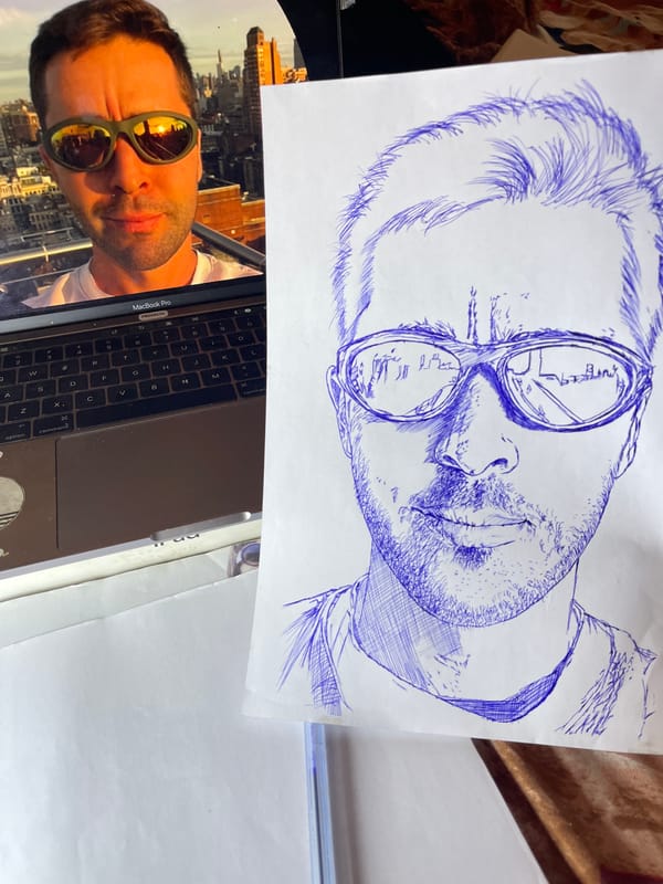 Artist sketches portrait series in blue ink in Jos