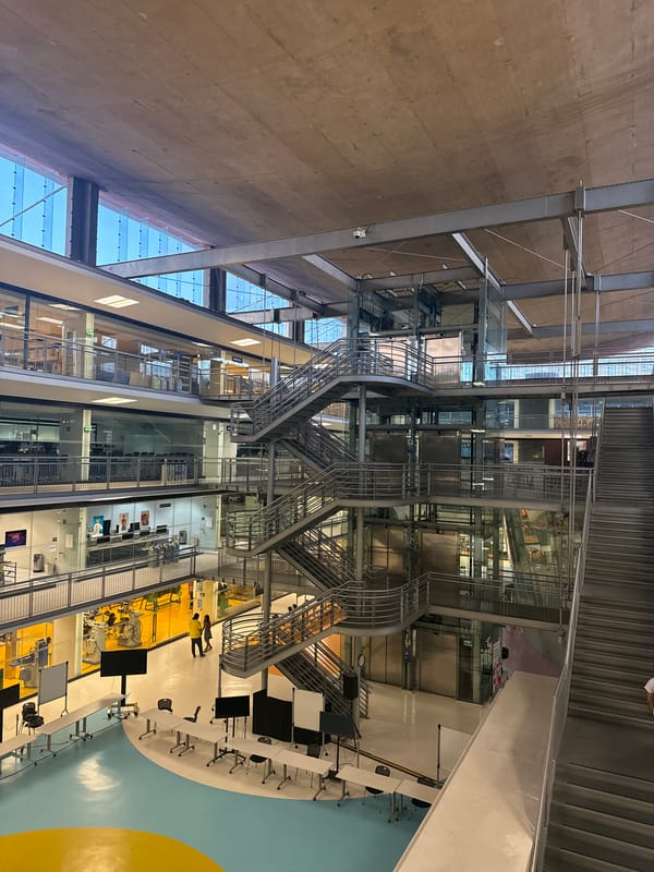Person walks through modern Mexico City building interior