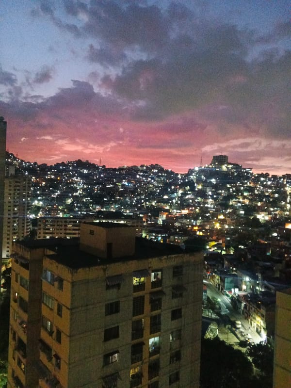 Nighttime urban cityscape captured from multiple elevated viewpoints
