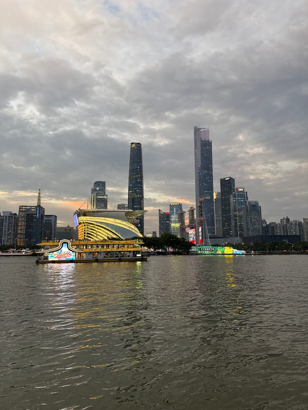 Guangzhou skyline and Canton Tower captured during evening illumination