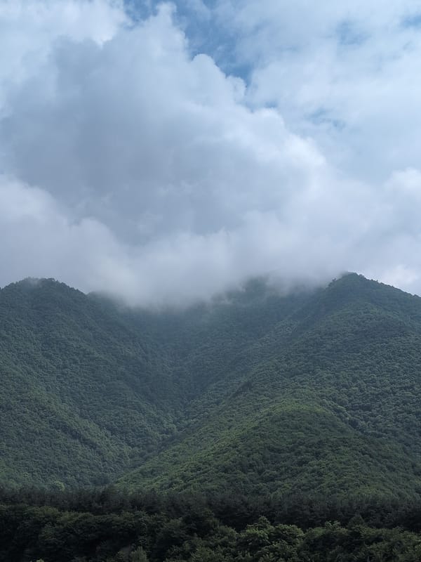 Mountain village life in Kish, Azerbaijan — donkeys, peaks, and mist