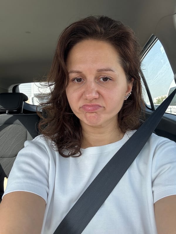 Woman observed in car with open sunroof in Dubai