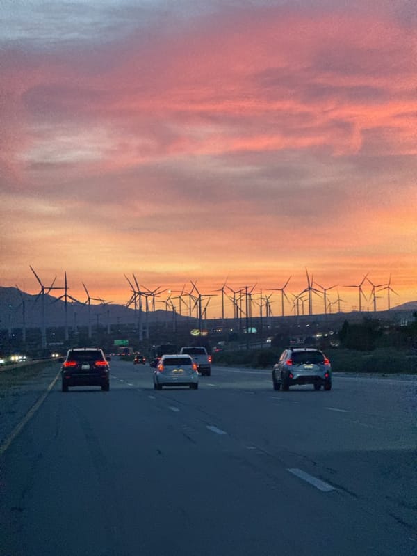 Evening highway traffic captured near Desert Hot Springs wind farms
