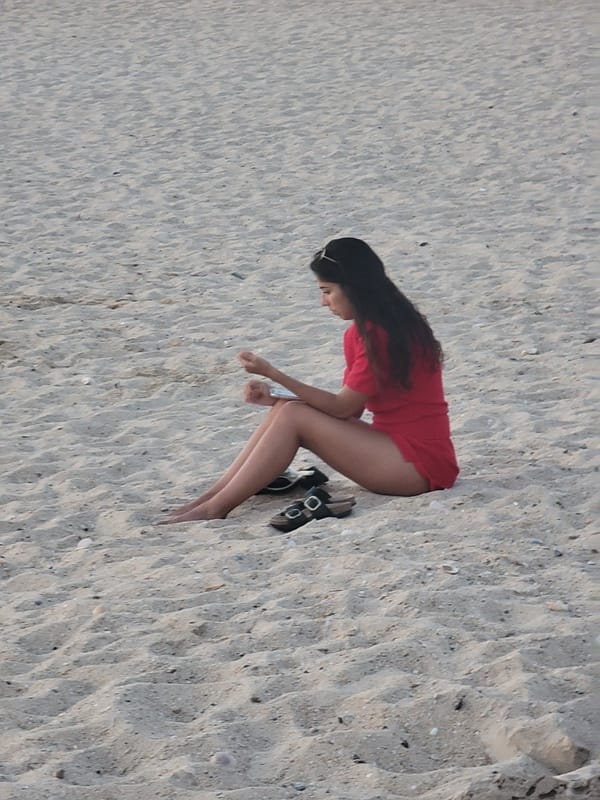 Sunset session on Quarteira beach, red dress and rippled sand
