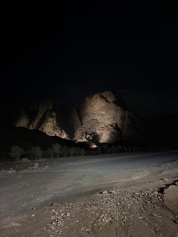 Nighttime cliff and road scenes documented near Egyptian mausoleum