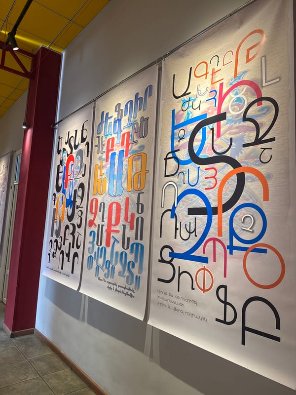 Art exhibition featuring Armenian typography and paintings documented in Yerevan