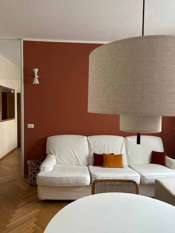 Interior living space documented in Milan