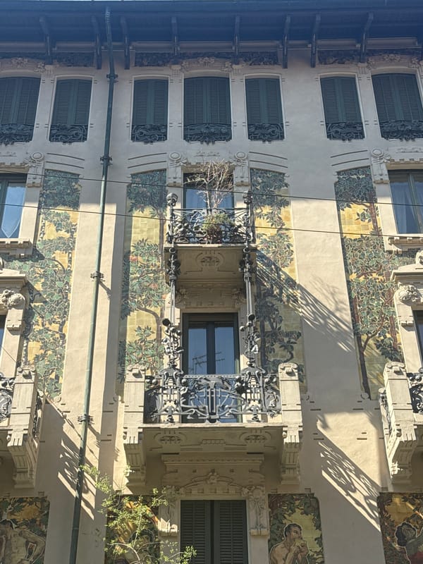 Milan architecture and outdoor seating observed during midday