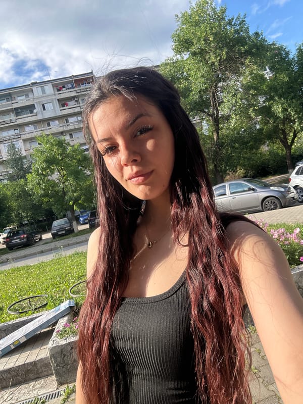 Woman documents afternoon with selfies, dog in Sliven, Bulgaria
