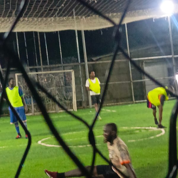 Night football and street grilling in Akwanga, Nigeria