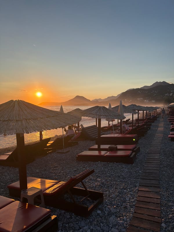 Sunset over Bar's beach, mountains on the horizon