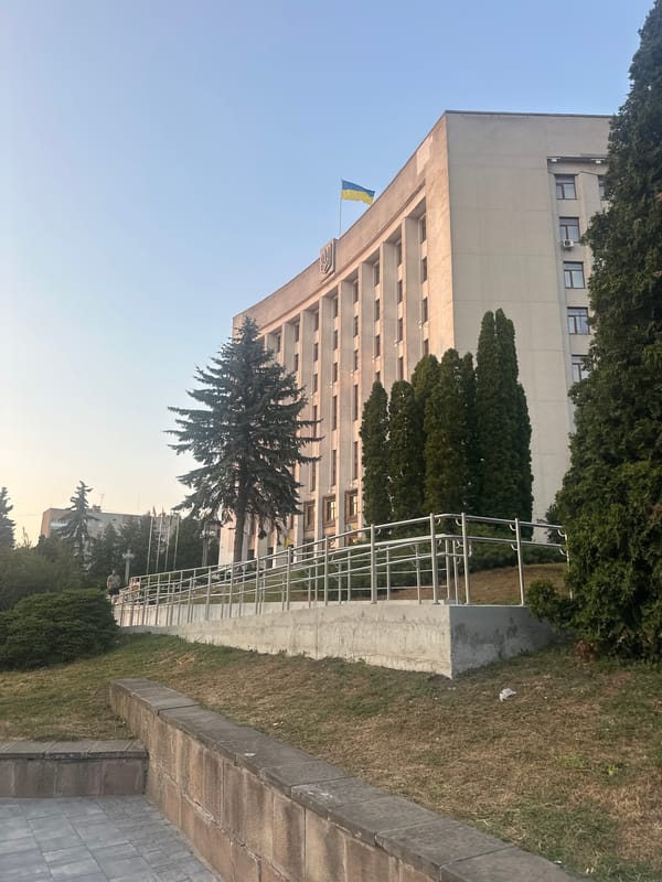 Ternopil city center at golden hour, streets and civic buildings