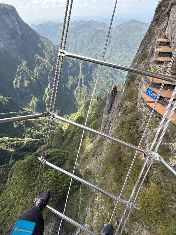 Person photographed on mountain bridge in Yongding District, China