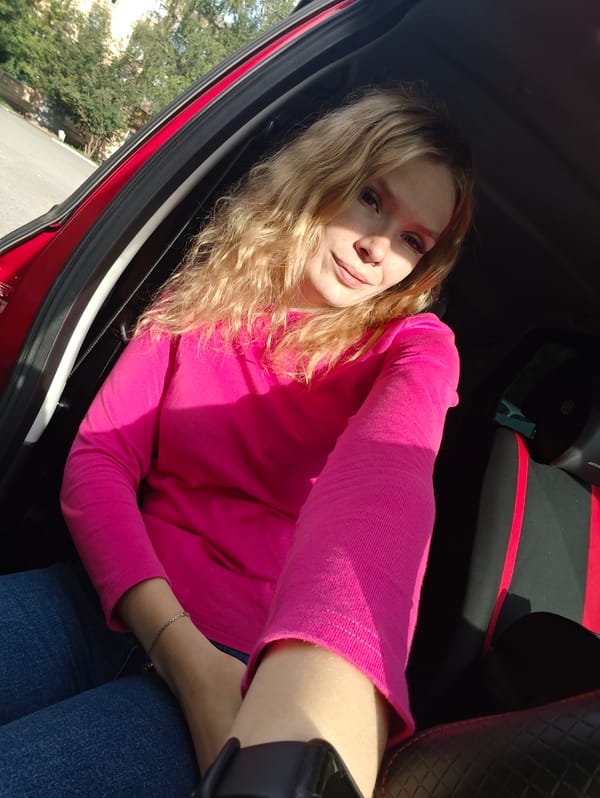 Car selfies and a rooftop skyline in Izhevsk