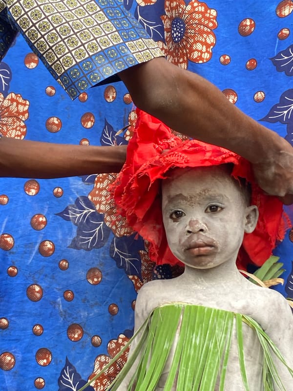 Traditional ceremony with painted children documented in Achara, Nigeria