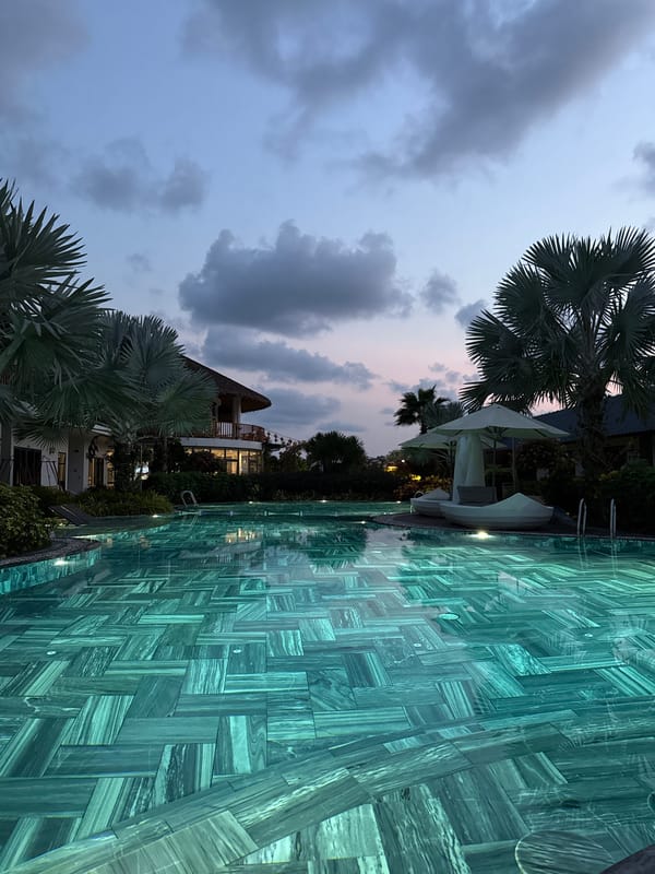 Resort pool captured at twilight in Phú Quốc Vietnam
