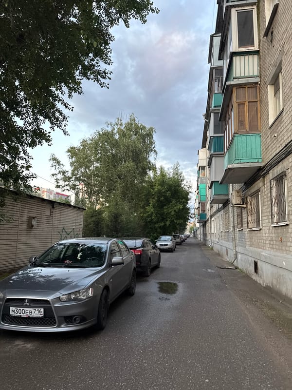 Afternoon at a Kazan weightlifting gym, streets outside at dusk