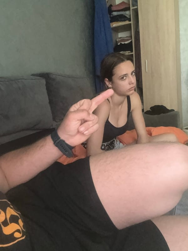 Couple photographed on couch in Pernik, Bulgaria