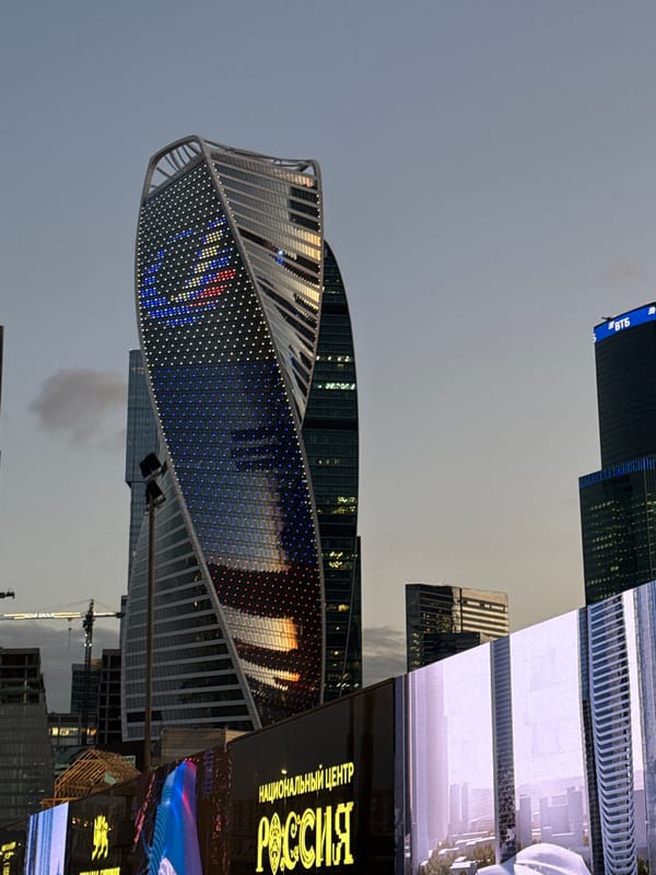 Moscow-City skyline at dusk, Neva Towers front and center