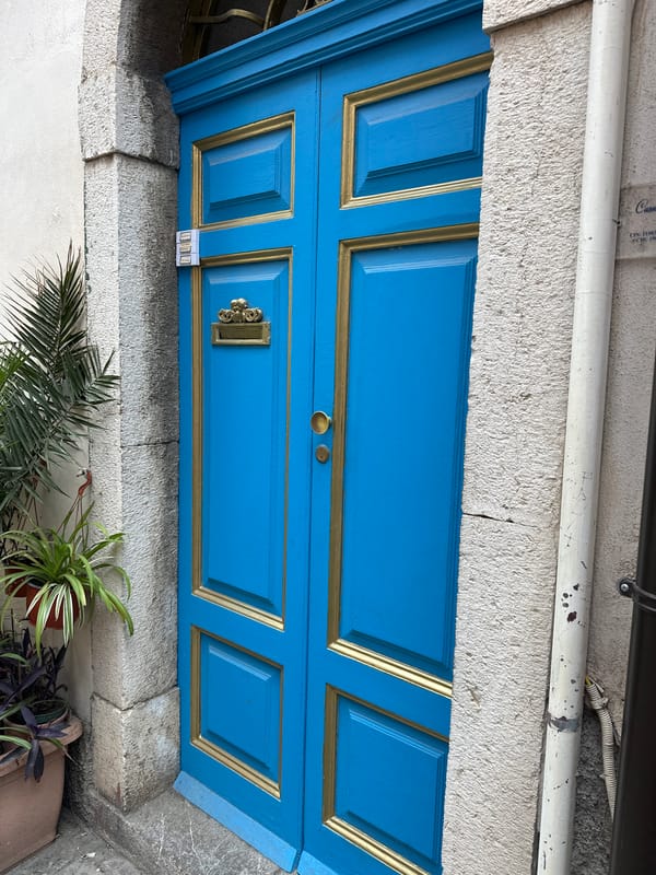 Tourist captures Taormina street scenes and colorful architecture