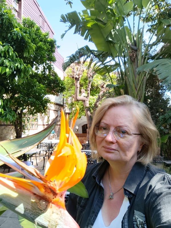 Tourist documents morning exploration of historic Antalya neighborhoods