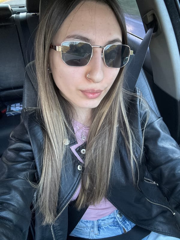 Woman takes car selfie in Bulgarian village