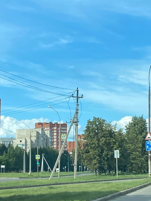 Driving through Tolyatti's residential streets on a sunny afternoon