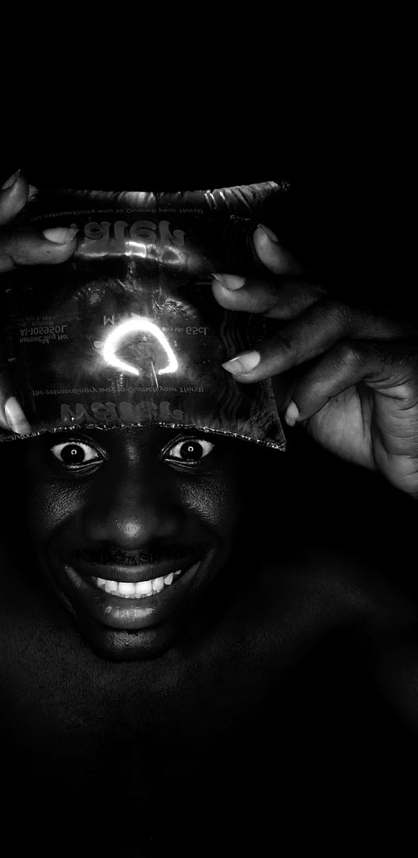 Person photographed with water pouch, package in Narayi