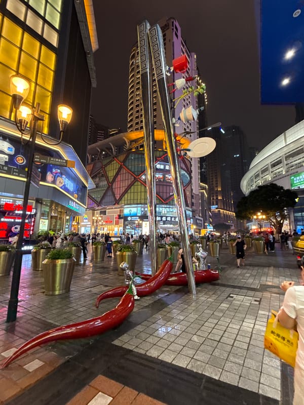 Chongqing District Bustles With Tourist Activity and Street Life