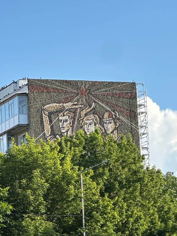 Colorful building mural documented in sunny Lovech, Bulgaria