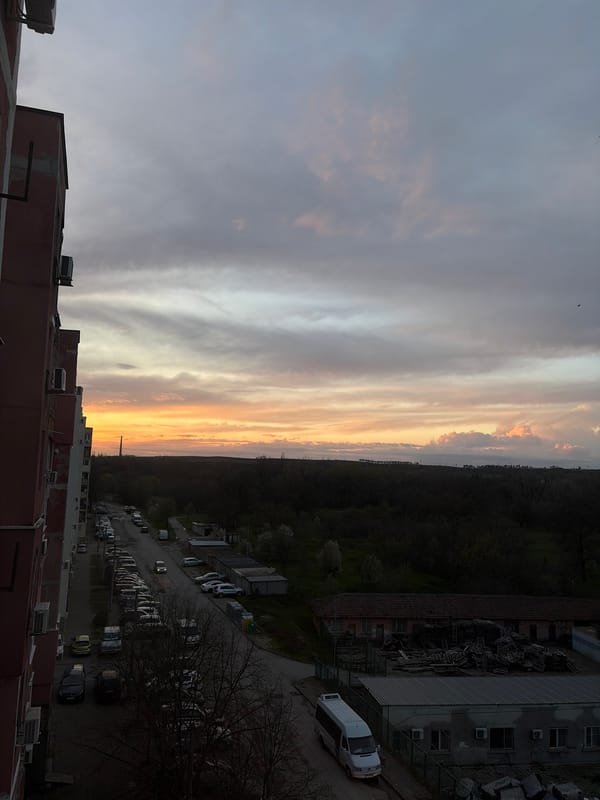 Sunset colors illuminate Dimitrovgrad, Bulgaria cityscape at dusk