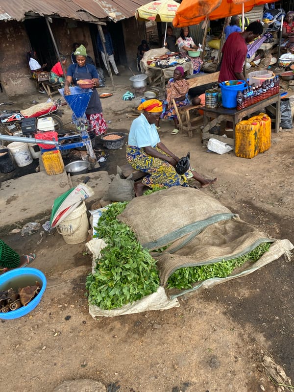 Midday market hustle across the streets of Bukuru, Nigeria