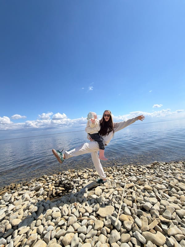 Family enjoys leisurely morning at Volga River beach in Kamyshin