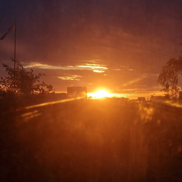 Vivid summer sunset colors the sky over Aktobe
