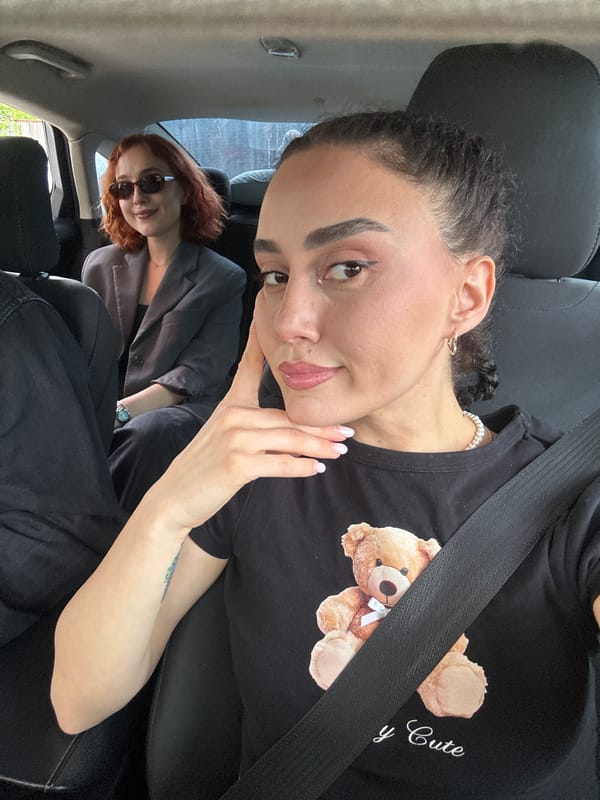 Two women photographed in car during brief Tbilisi journey