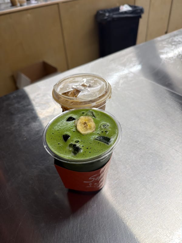 Two beverages photographed on metal surface in Indio