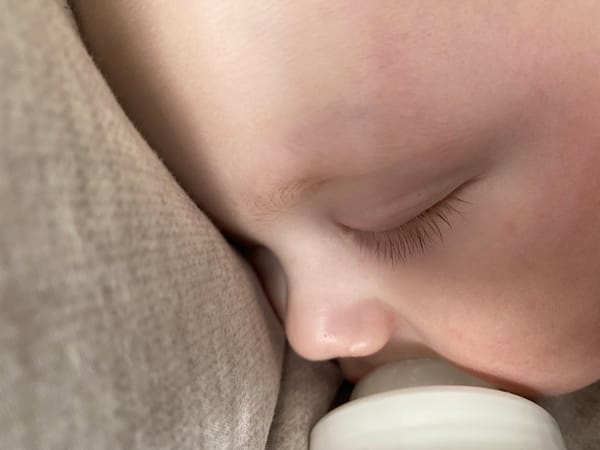 Woman documents morning routine with infant in Izhevsk