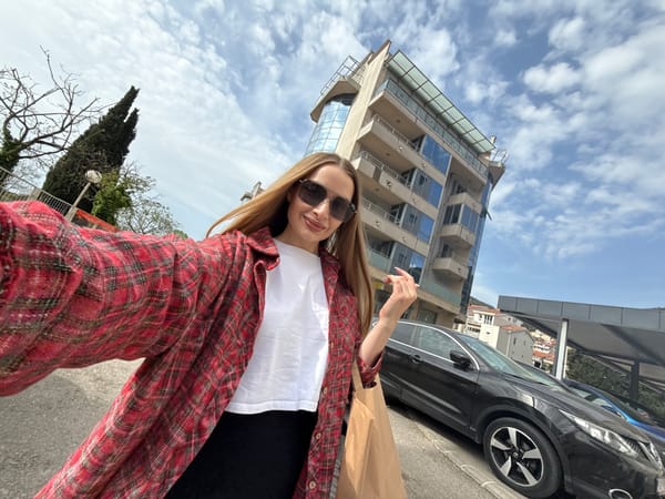 Woman with bag spotted on Budva sidewalk