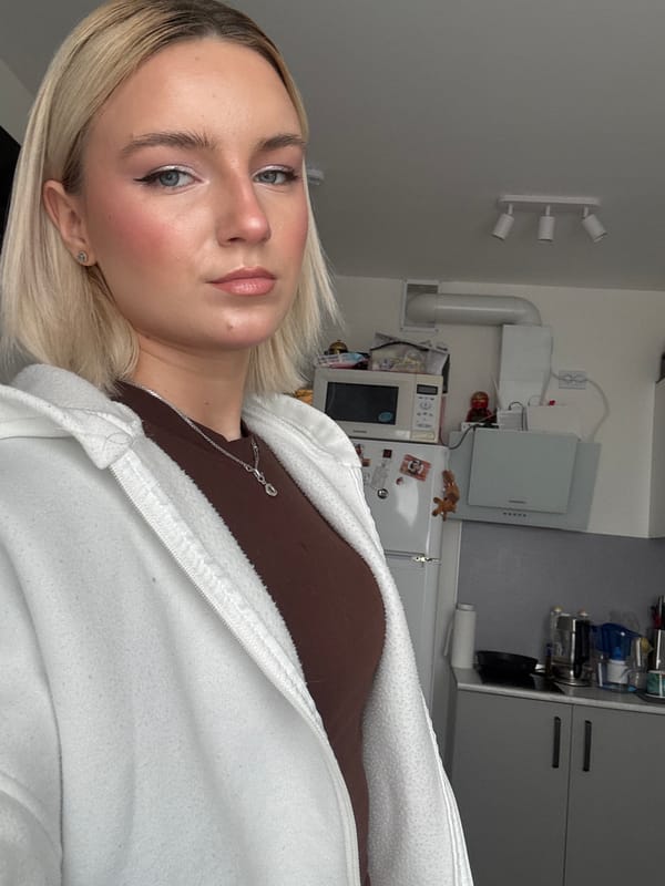 Woman photographed in kitchen setting in Russia