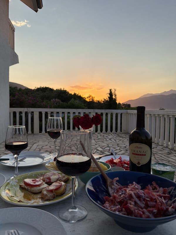 Sunset dinner documented in Gošići, Montenegro featuring local cuisine