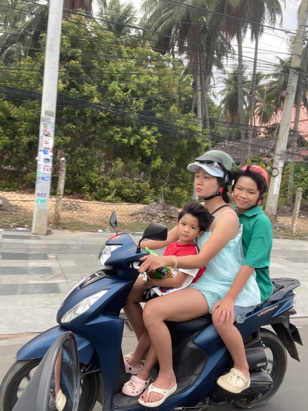 Morning commute scenes documented in Vietnamese neighborhood