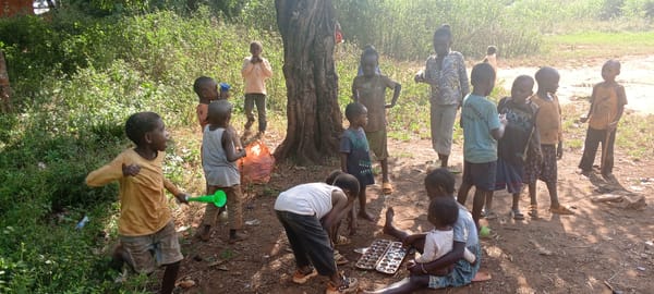 Children gather for outdoor games in Ngalula, DRC