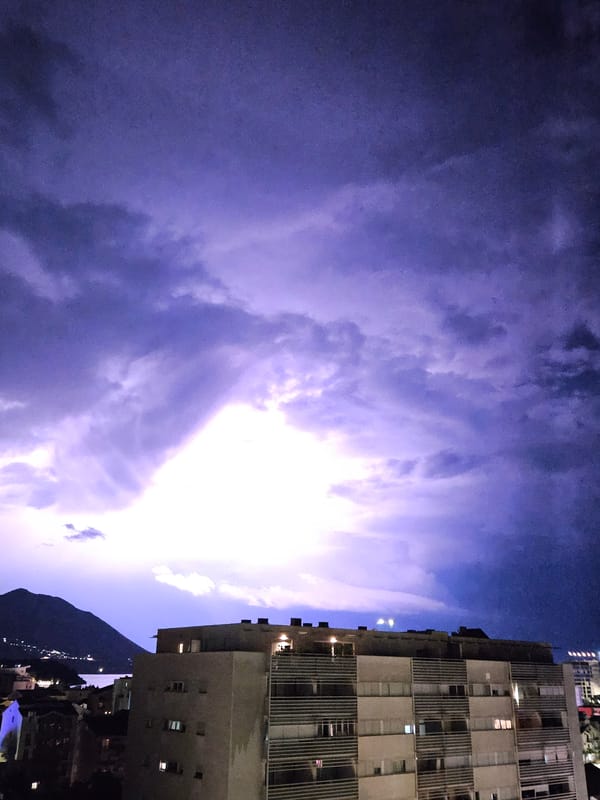 Lightning storm illuminates Budva Montenegro night sky